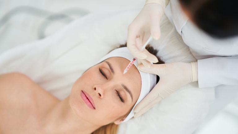 A woman having botox injection at Battersea and Nine Elms Aesthetics Clinic after reading Q&A
